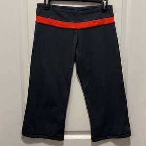 Lululemon Astro Wunder Under Crop Navy with Red Waistband size 8
